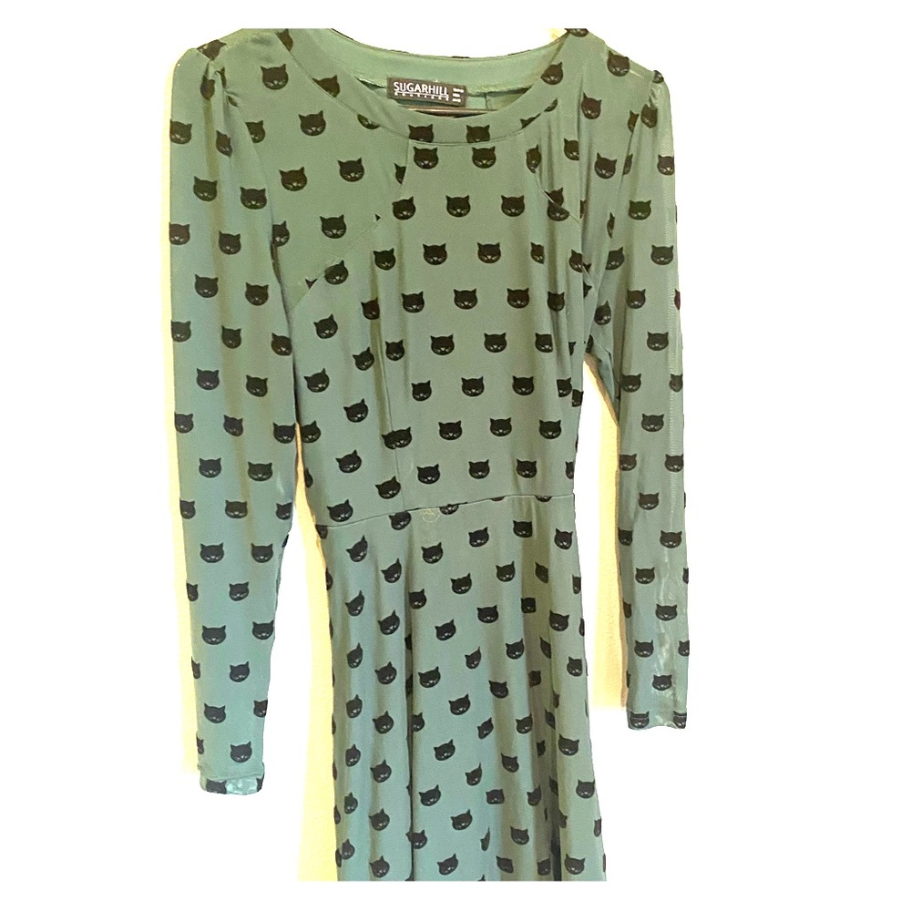 Unique emerald green, black cat dress